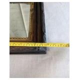Antique Victorian Eastlake shadow box frame mirror,dark walnut wood exterior and an ornate gold gilt trim
