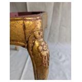 Italian Florentine side table from the 1950s,distinctive weathered gold gilt finish over a red base