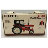 Two Vintage ERTL Toys Die Cast Miniature Tractors 1= 1/64 Scale 4-Wheel Drive Tractor 1= 1/32 Scale IH FWD/ Tractor In Original Box