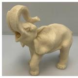 4.5" x 7" x 8" Resin Elephant Statue With Trunk Up