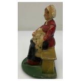 Vintage Heavy Cast Iron Old Woman On Bench Door Stop 3" x 4" x 5"