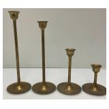 Set Of Four Brass Candle holders Tallest Being 9"