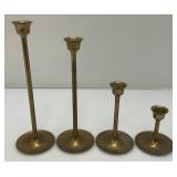 Set Of Four Brass Candle holders Tallest Being 9"