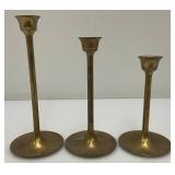 Set Of Three Brass Candle holders Tallest Being 7"