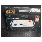 The Black Series Air Hockey, Thomas