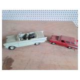 2 Model Cars ~ 1 missing wheel but in the seat