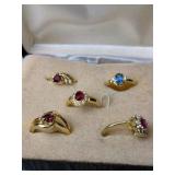 Unresearched! Lot of 5 Gold-Tone Rings With Red & Blue Stone Accents In Display Box