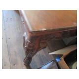 Carved wood coffee table