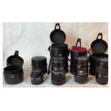 Minolta Cameras and Lens Lot with Tripod - Maxxum7000i, Maxxum 7000 with Flash, 50 mm lens with case, 35-200mm lens, 28-135mm lens with case,100-300m lens with case, Argus Pre-Viewer, Vivitar Tripod w