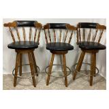 Solid Oak Bar and 3 Swivel Bar Stools - Bar 53.25"W x 19"D x 41"H Bar Stool:17"W x 19"D x 40"H - 27" Seat Height  - Note: Small tear in one bar stool, and patch on another bar stool
