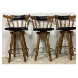 Solid Oak Bar and 3 Swivel Bar Stools - Bar 53.25"W x 19"D x 41"H Bar Stool:17"W x 19"D x 40"H - 27" Seat Height  - Note: Small tear in one bar stool, and patch on another bar stool