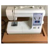 Sears Kenmore Sewing Machine in Wooden Table- Model 385.18836 -Plus Accessory Kit Model 213702016 and Sewing Basket (Table 31.75"W x 19.75"D x 30.5"H) - Width Extended is 63.25"W