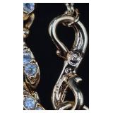 Two Sets of Swarovski Bracelets and Earrings with Swan Logo