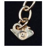 Two Sets of Swarovski Bracelets and Earrings with Swan Logo