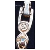 Two Sets of Swarovski Bracelets and Earrings with Swan Logo