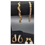 Two Sets of Swarovski Bracelets and Earrings with Swan Logo