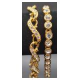 Two Sets of Swarovski Bracelets and Earrings with Swan Logo