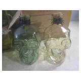 (A-2) 2 Glass Skull Bottles with Co...