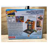Hot Wheels City Toy Car Track Set, Downtown Car Park Playset with 1:64 Scale Vehicle, 4 Levels, Working Lift & Exit Chute