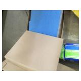 Box of office supplies, foil tape r...
