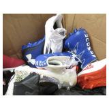 Assorted pairs of new football clea...
