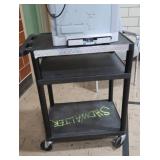 HP LASERJET 2600ON ON PLASTIC ROLLING CART