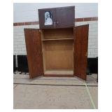 TALL WOODEN CUPBOARD
