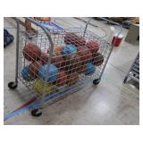 BASKETBALL CAGE ON WHEELS WITH LOTS OF BASKETBALLS