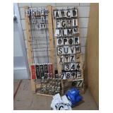3 RACKS PLUS LOTS OF SELF REFLECTING LETTERS AND NUMBERS