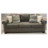 Ashley 3-Cushion Gray Sofa With Nailhead Trim - Matches Lot 21
