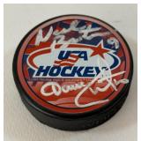 Neal Broten and Dave Christian Autographed USA Hockey Puck