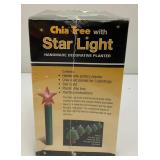 Two Vintage Chia Collectibles Including Chia Tree With Star Light (Factory Sealed And Chia Pet Ram (Open box)