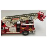 Two Vintage Plastic Fire Trucks Including Nylint 16" And One Battery Operated 20"