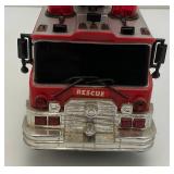 Two Vintage Plastic Fire Trucks Including Nylint 16" And One Battery Operated 20"