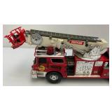 Two Vintage Plastic Fire Trucks Including Nylint 16" And One Battery Operated 20"