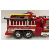Two Vintage Plastic Fire Trucks Including Nylint 16" And One Battery Operated 20"