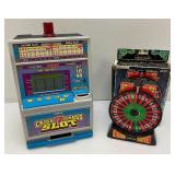 Miniature Criss 7 Cross Slot Machine Battery Operated 6" x 7 1/2" x 12 1/2" (Untested) And Casino Wheel With Original Box