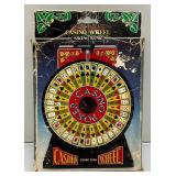 Miniature Criss 7 Cross Slot Machine Battery Operated 6" x 7 1/2" x 12 1/2" (Untested) And Casino Wheel With Original Box