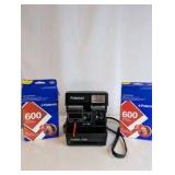 Vintage Polaroid OneStep Flash instant camera, with 2 packs film