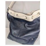 Coach Mickie Drawstring bag in dark navy and white spectator pebble leather