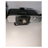 Minolta XG-7 35mm SLR film camera includes black carrying case, 2x auto tele converter