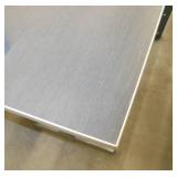 Two tables 84x24, one is missing a leg, grey surface