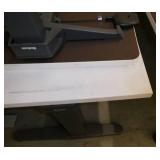 Two Steelcase electric adjustable height tables/desks
