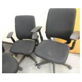 3 black chairs of various type