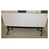 THREE 72x24 Flip-top table on wheels - white tops