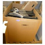 Pallet of table legs and a portion of a table
