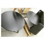 Two Herman Miller round tables 32 inch diameter, and a table top sound barrier