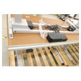Two height adjustable tables 24x48