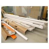Pallet of led light fixtures 2-1/2 inches wide most are 12 ft long, approx 20