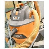 Pallet with two 12gallon Ridgid shop vacs and misc metal